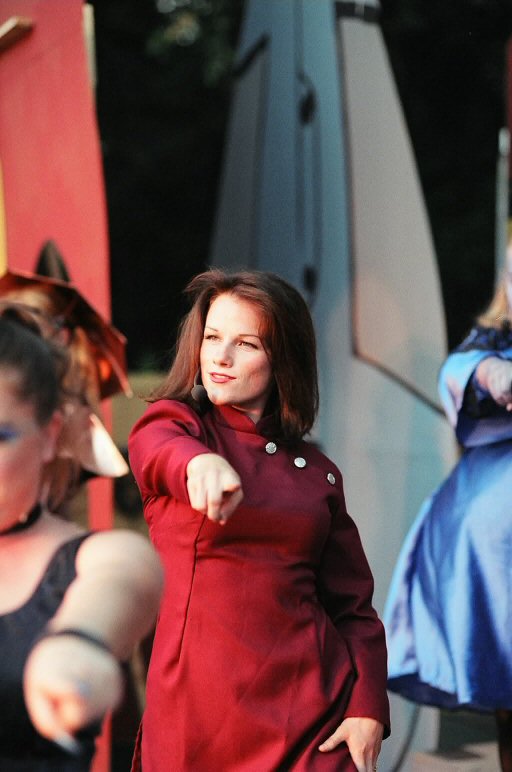 [Melody as Betty Rocket]