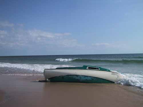 Low tide and a stranded boat on Block Island, RI.